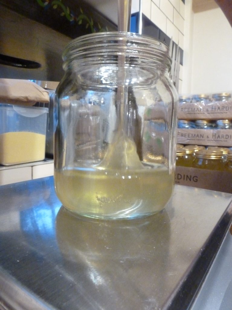 Bottling the honey.
